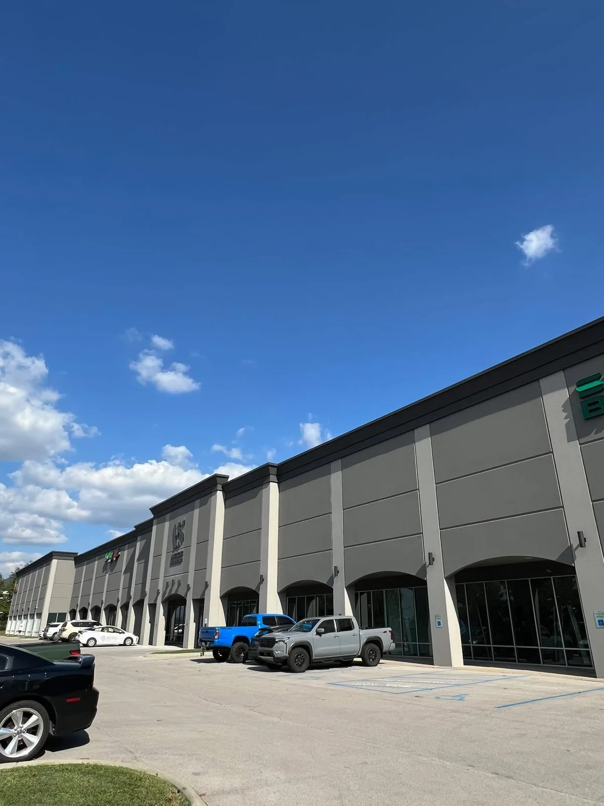 America's Floor Source large-format commercial exterior repaint in Central Kentucky