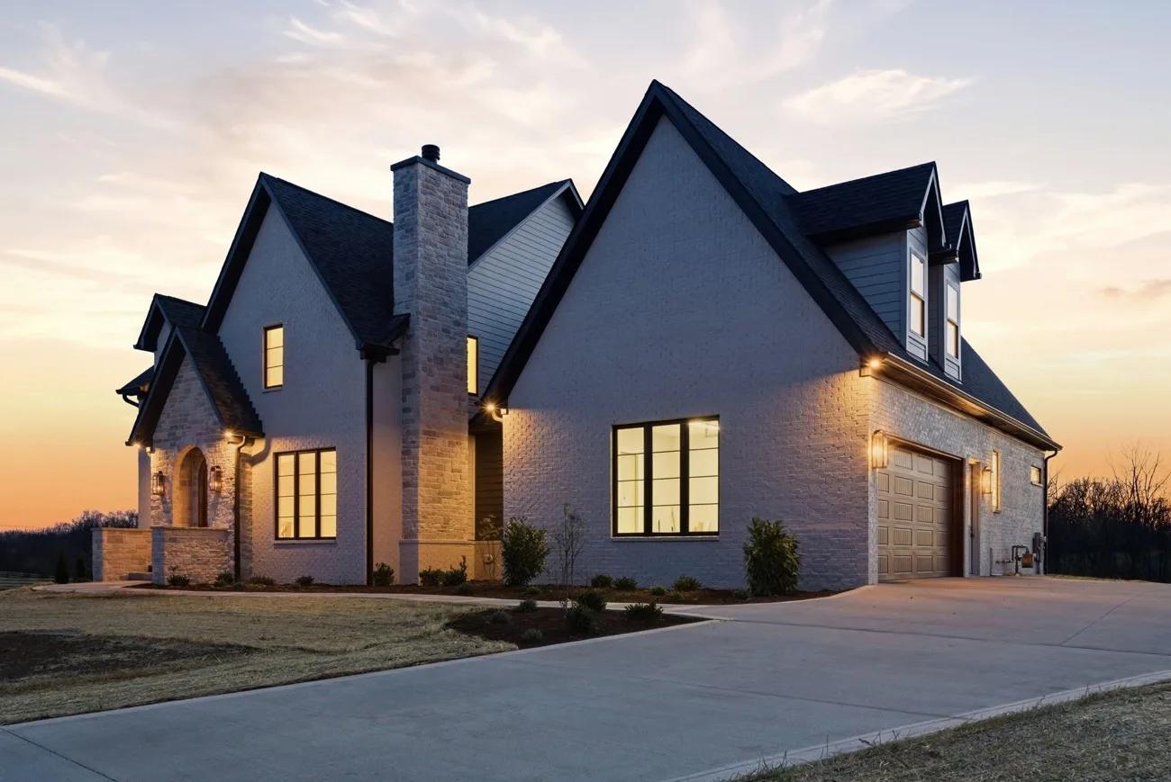 Exterior repaint of a Lexington, KY home at dusk