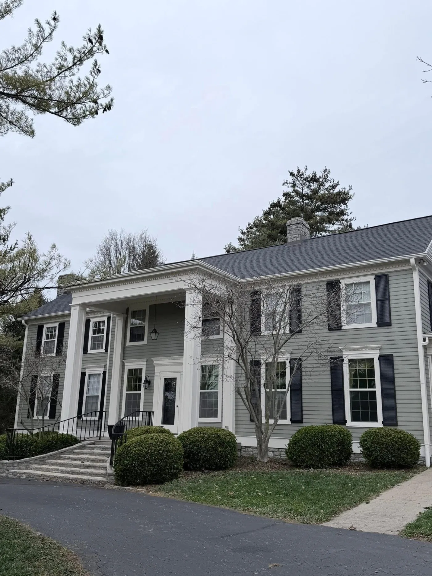 Pressure washing a home exterior